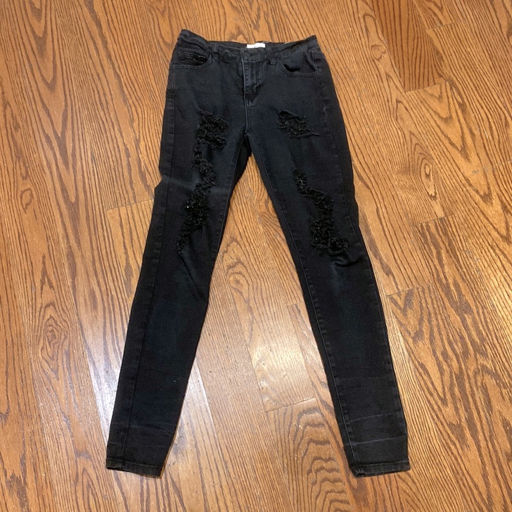 Black distressed stretch jeans